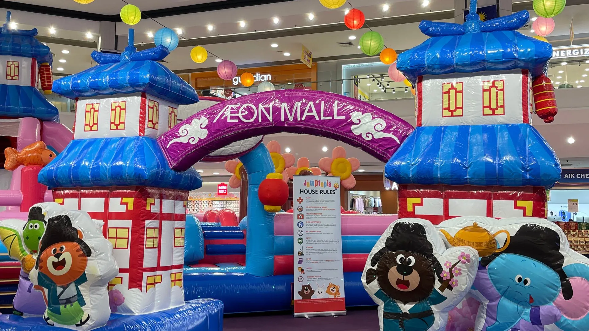 Jumptopia Holiday Village colorful inflatable play area